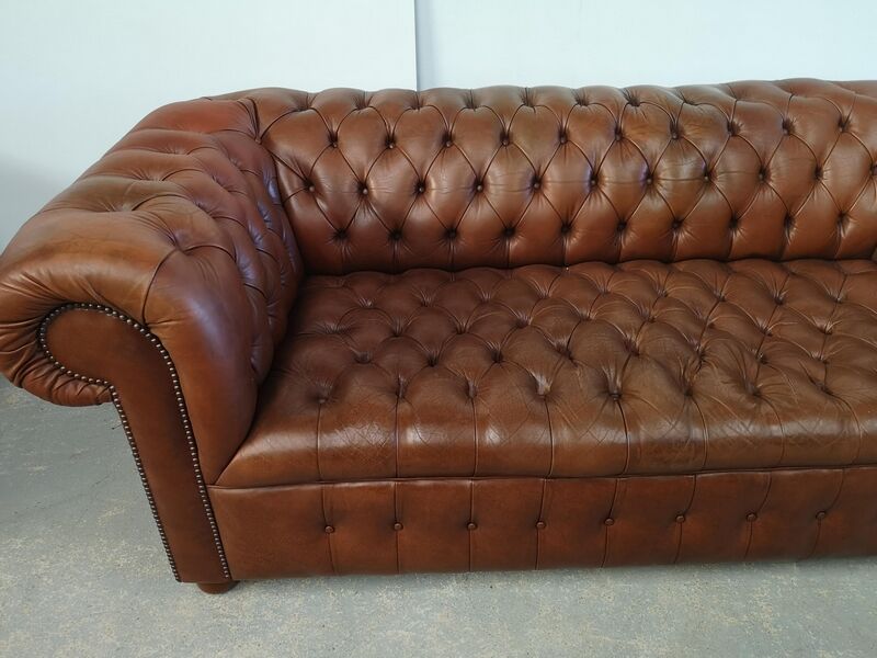 Light brown leather chesterfield sofa