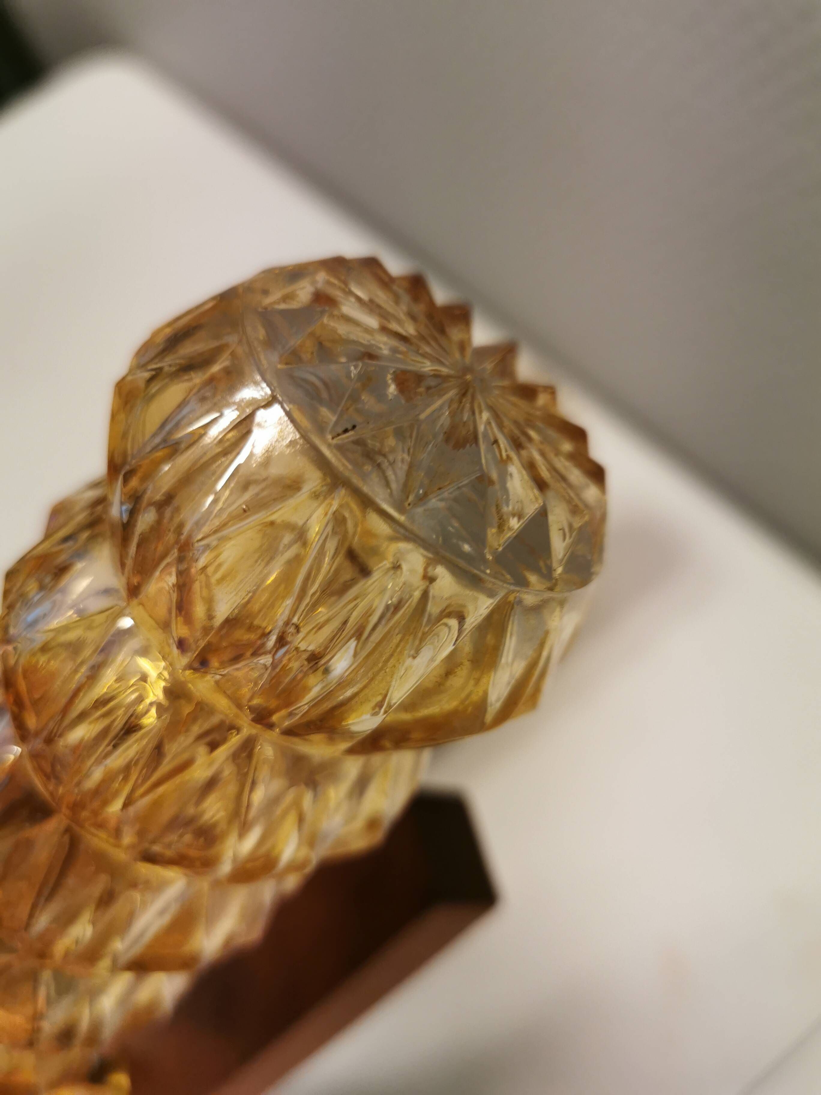 A set of Danish wall lights in champagne coloured glass with brass and teak.