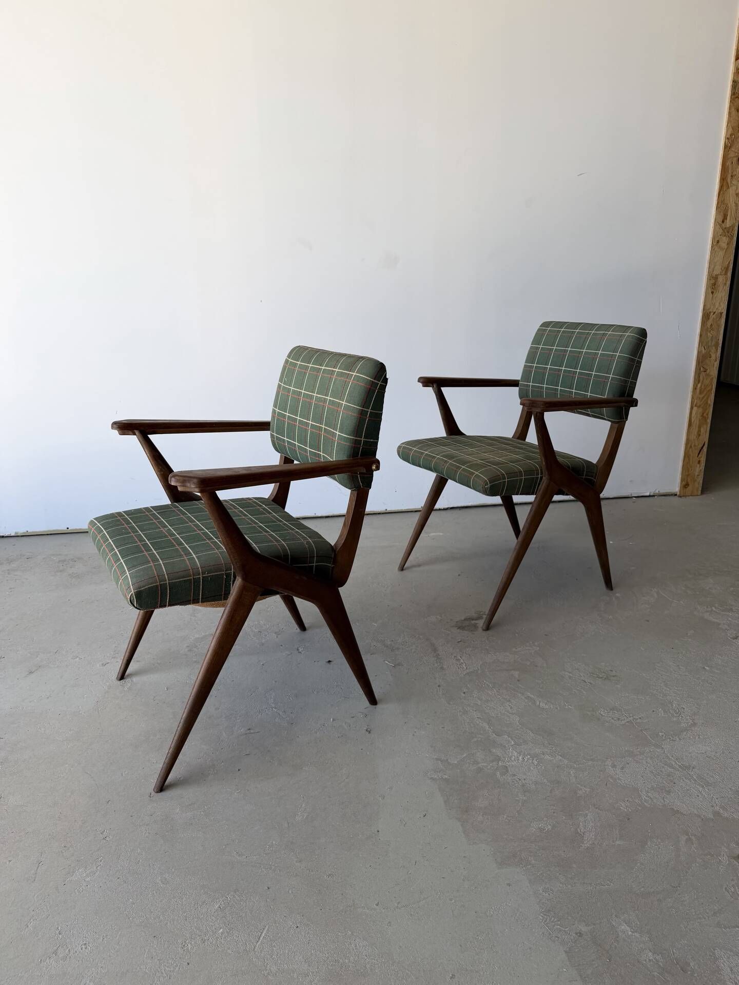 Pair of armchairs with a Scandinavian design in vintage teak from the 1960s.
