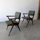 Pair of armchairs with a Scandinavian design in vintage teak from the 1960s.