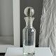 Small ribbed glass carafe, large round cap