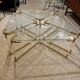 Coffee table and its 4 associated nesting tables in plexiglass and gold metal