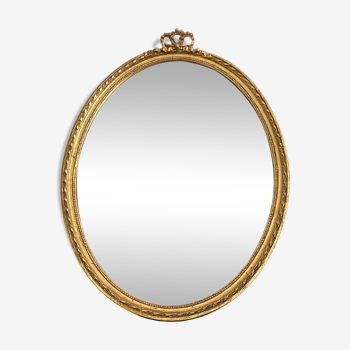Golden oval mirror 32x44cm