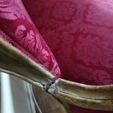 Louis XV style sofa in gilded wood and red pompadour fabric