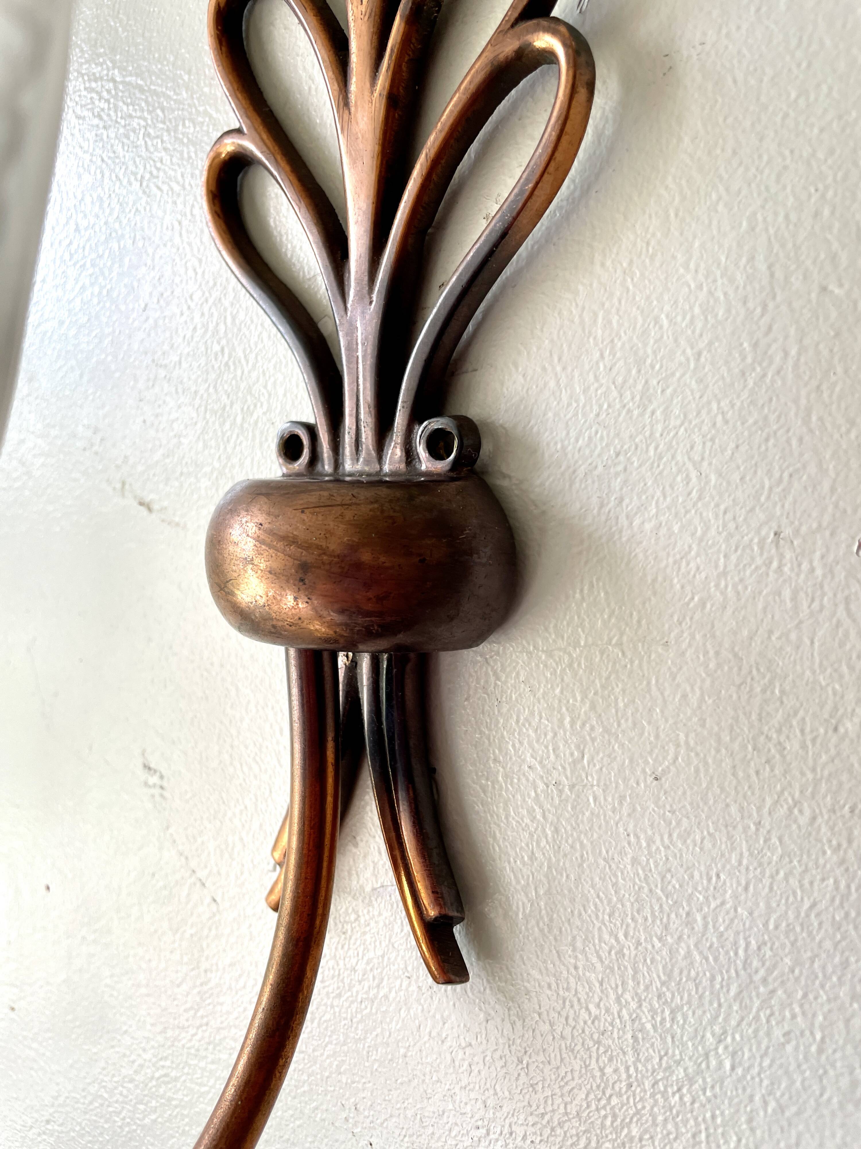 Pair of Art Deco wall lights, copper and frosted glass
