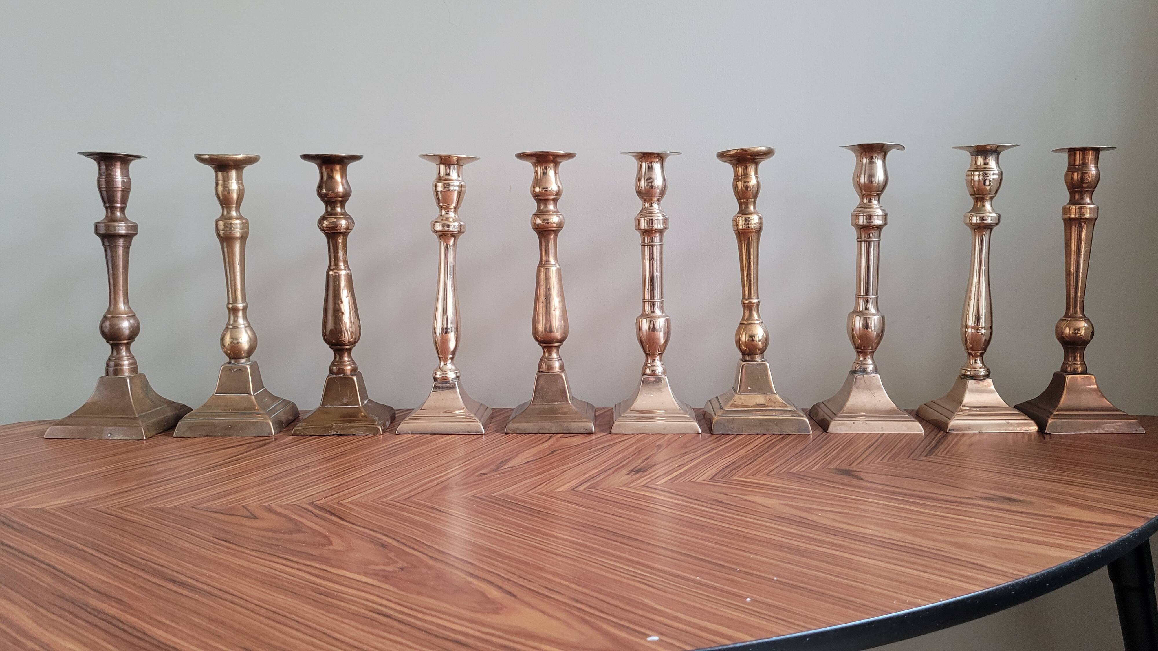 Set of 10 bronze-tinted brass candle holders 01 Pro