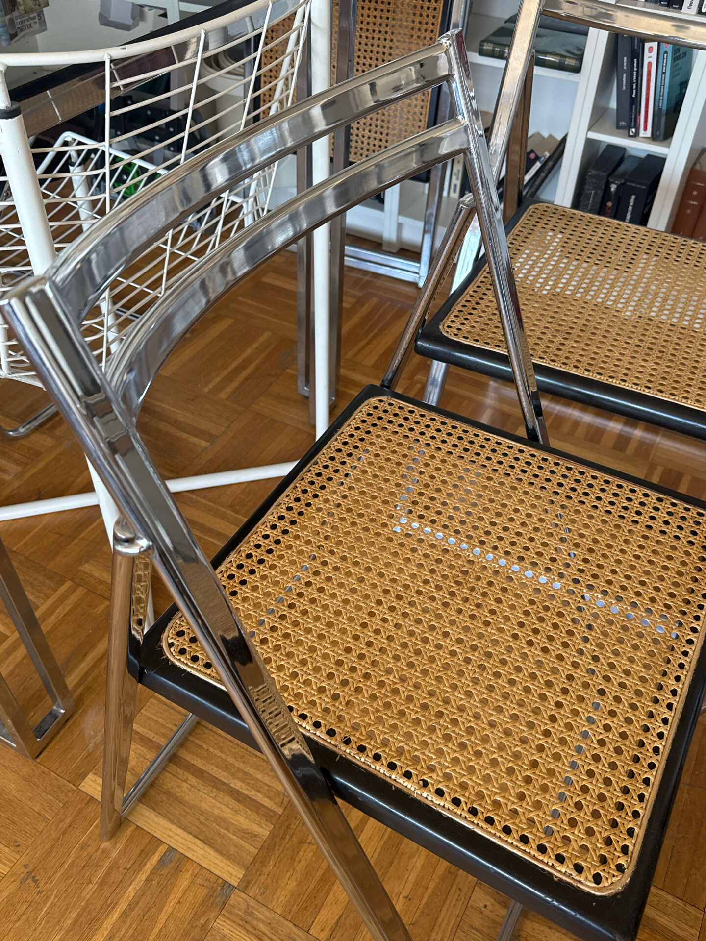 Set of 4 Italian folding chairs with caning.