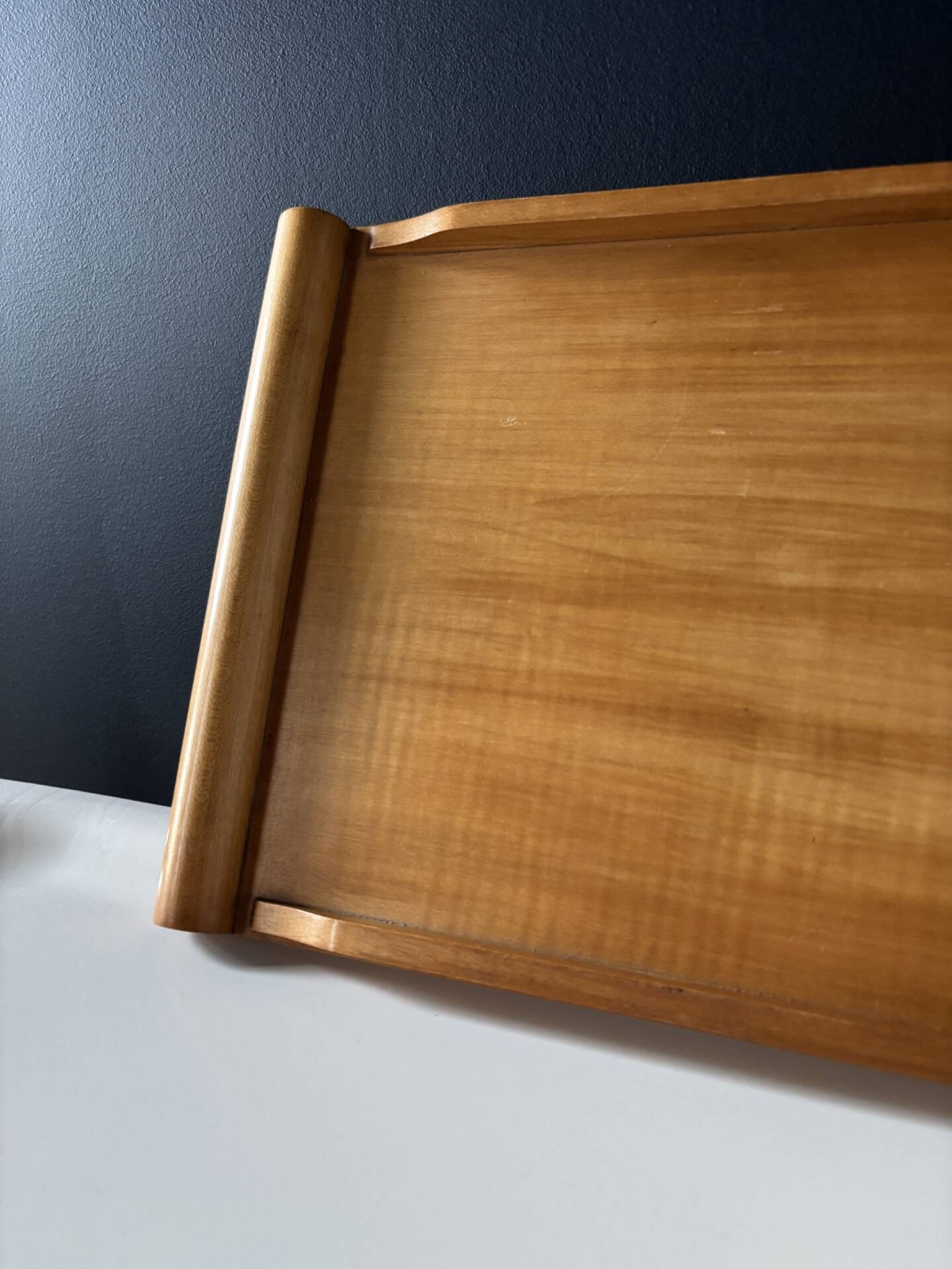 Vintage wooden plateau in Scandinavian style from the 60s — cylindrical handles.
