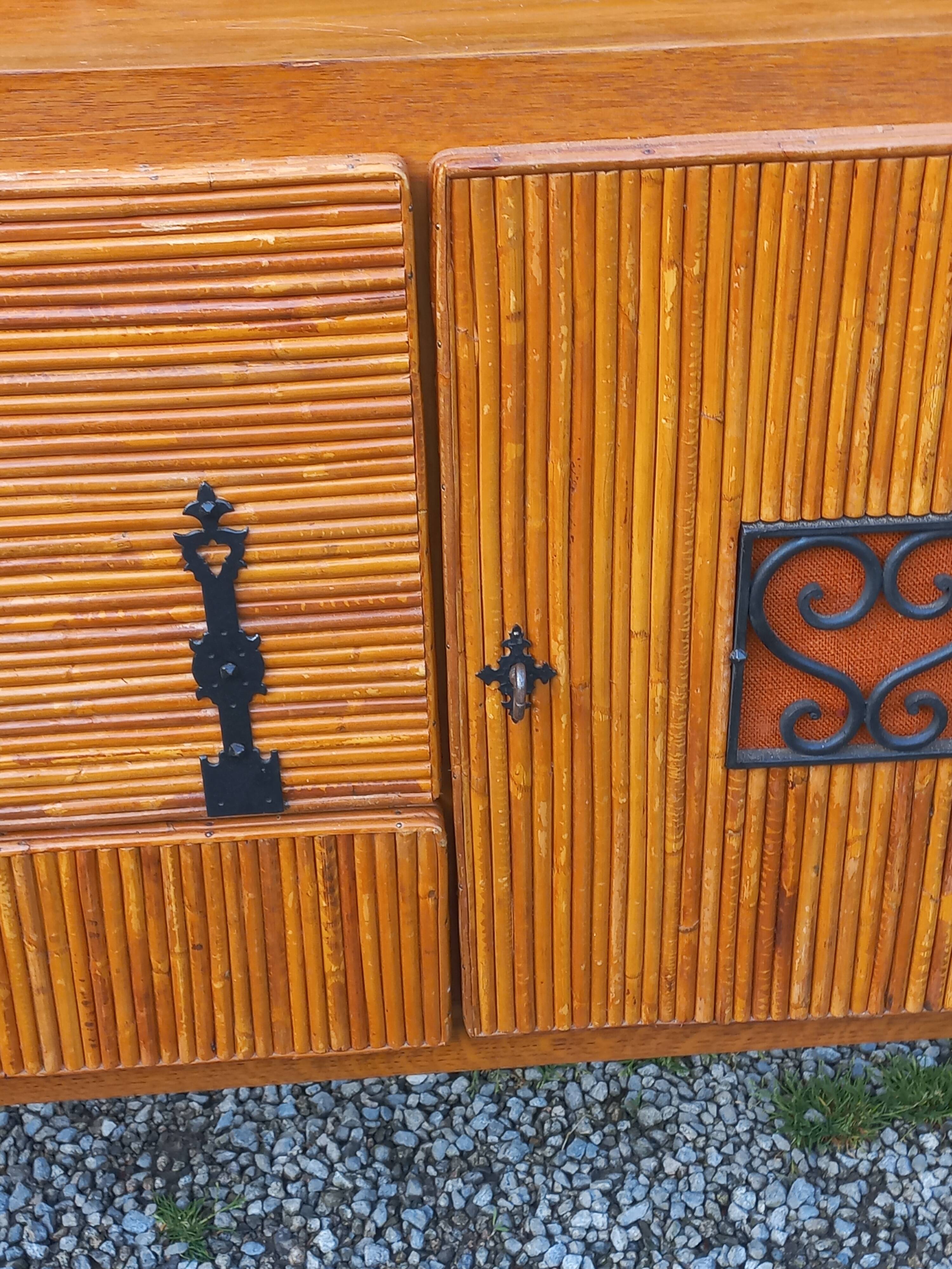 Bamboo and rattan enfilade attributed to Audoux and Minet.