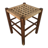 Wooden stool with woven rope seat