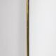Pair of narrow gilt brass mirrors. Circa 1970.