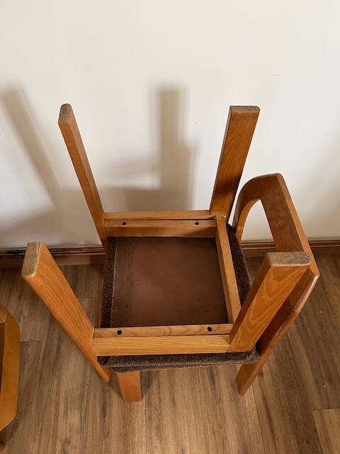 4 brown chairs