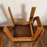 4 brown chairs