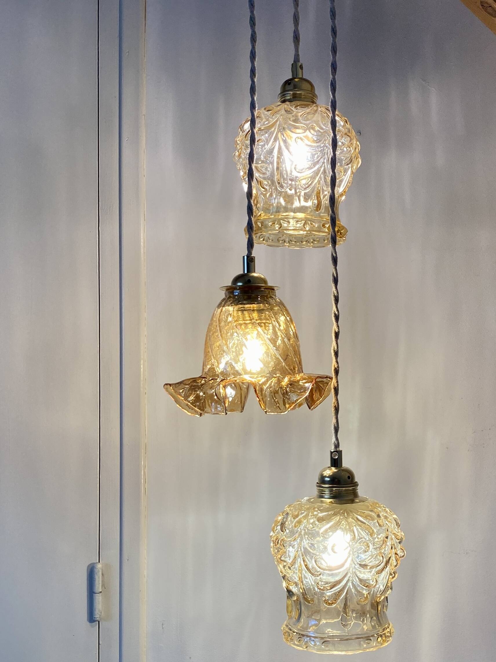 Vintage triple globe waterfall pendant light in amber glass