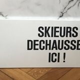 Vintage metal plate ski signage