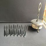 12 "Apollonox" fruit knives on silver metal support