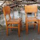 Pair of straw-seated chairs from the 1950s
