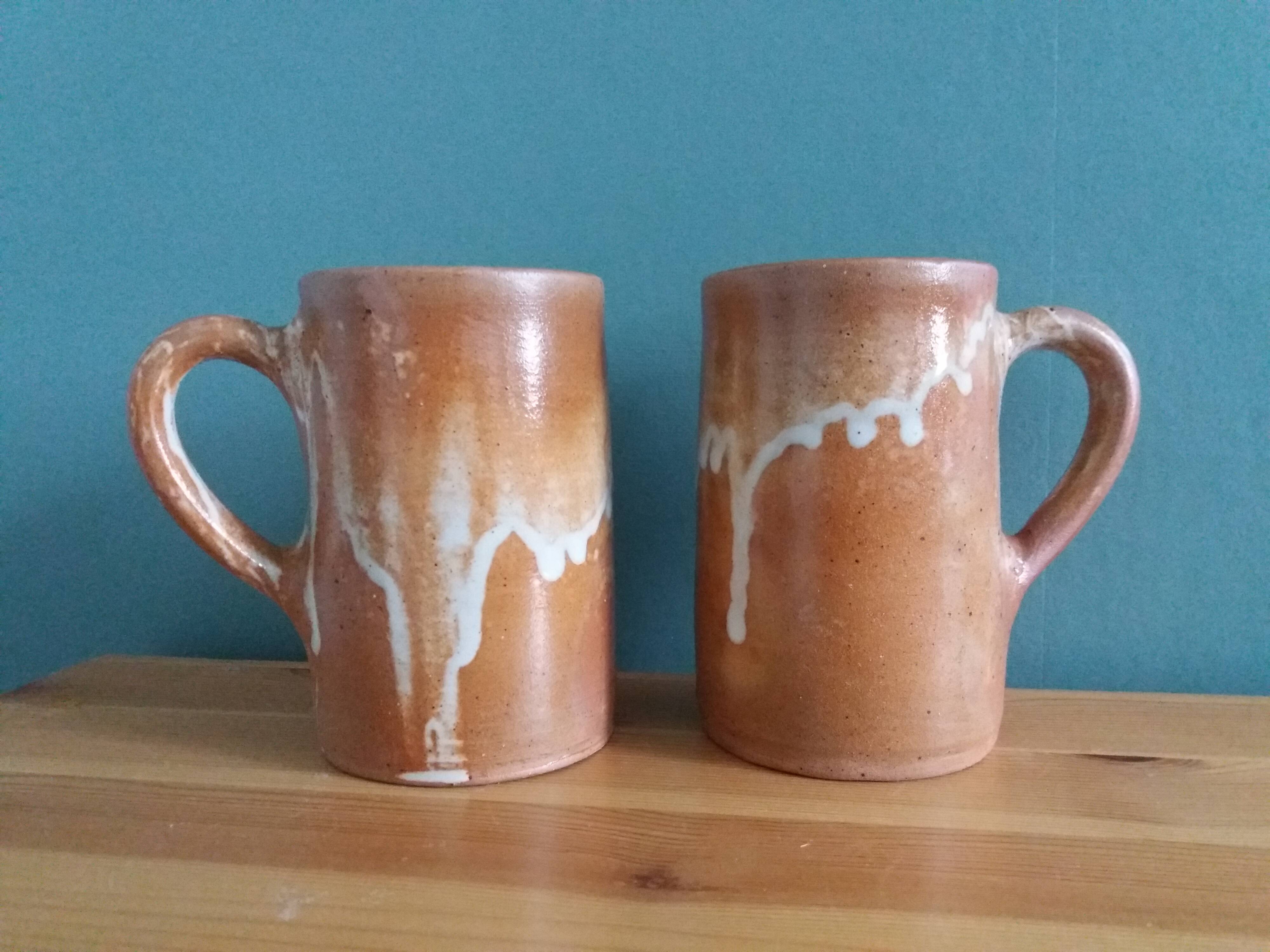2 enameled stoneware mugs cups