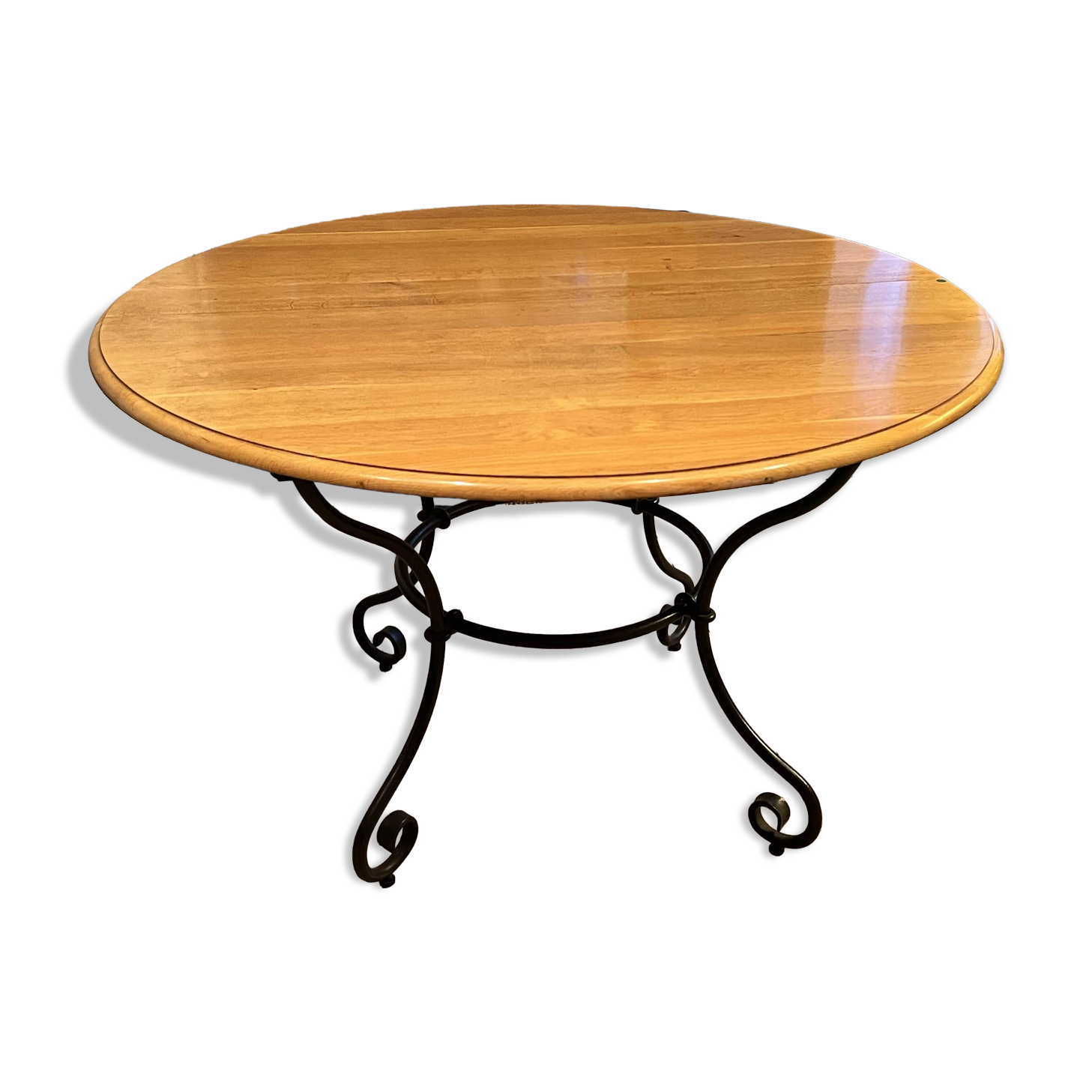 Extendable table in solid oak with wrought iron legs.