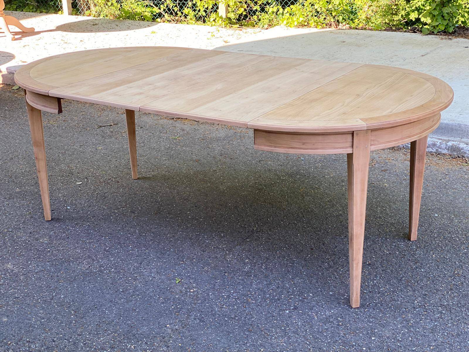 Louis XVI extendable round table in solid raw oak 210cm 19th century
