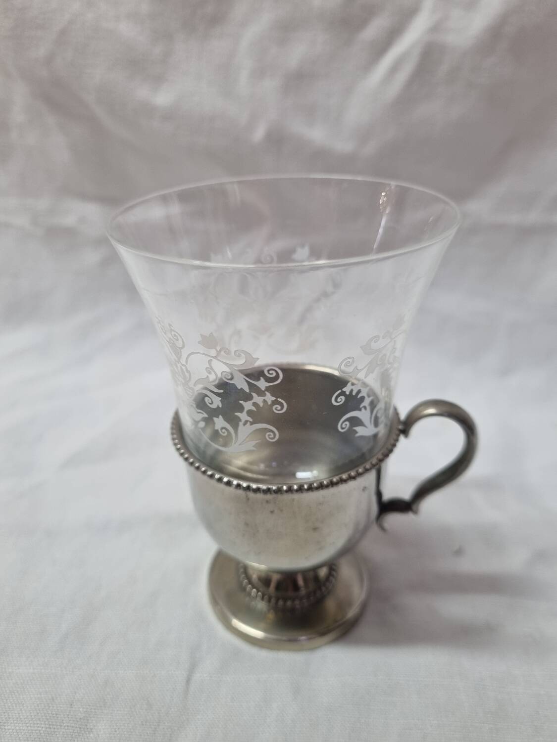 Engraved glass and glass holder early 20th century