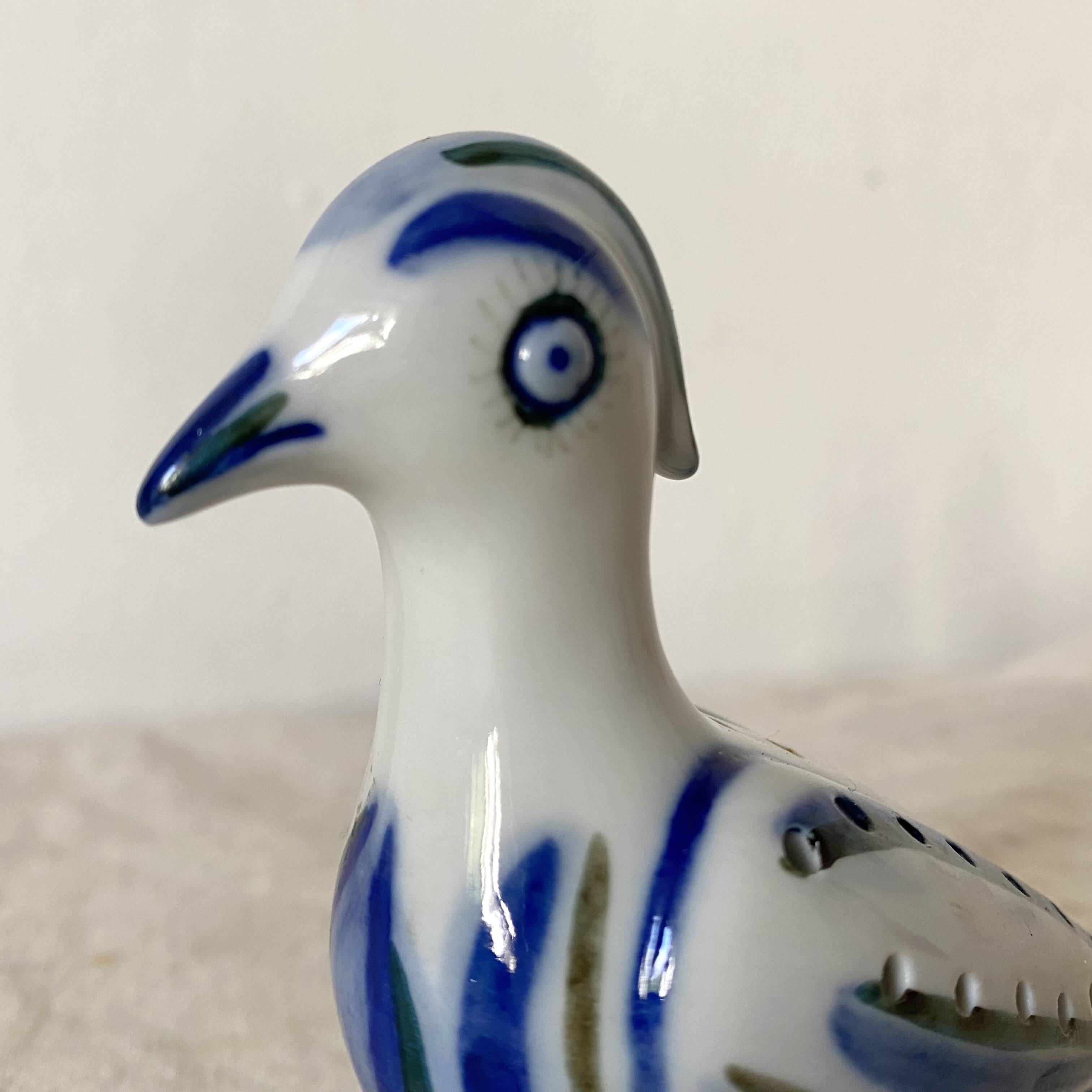 Porcelain bird, flower vase