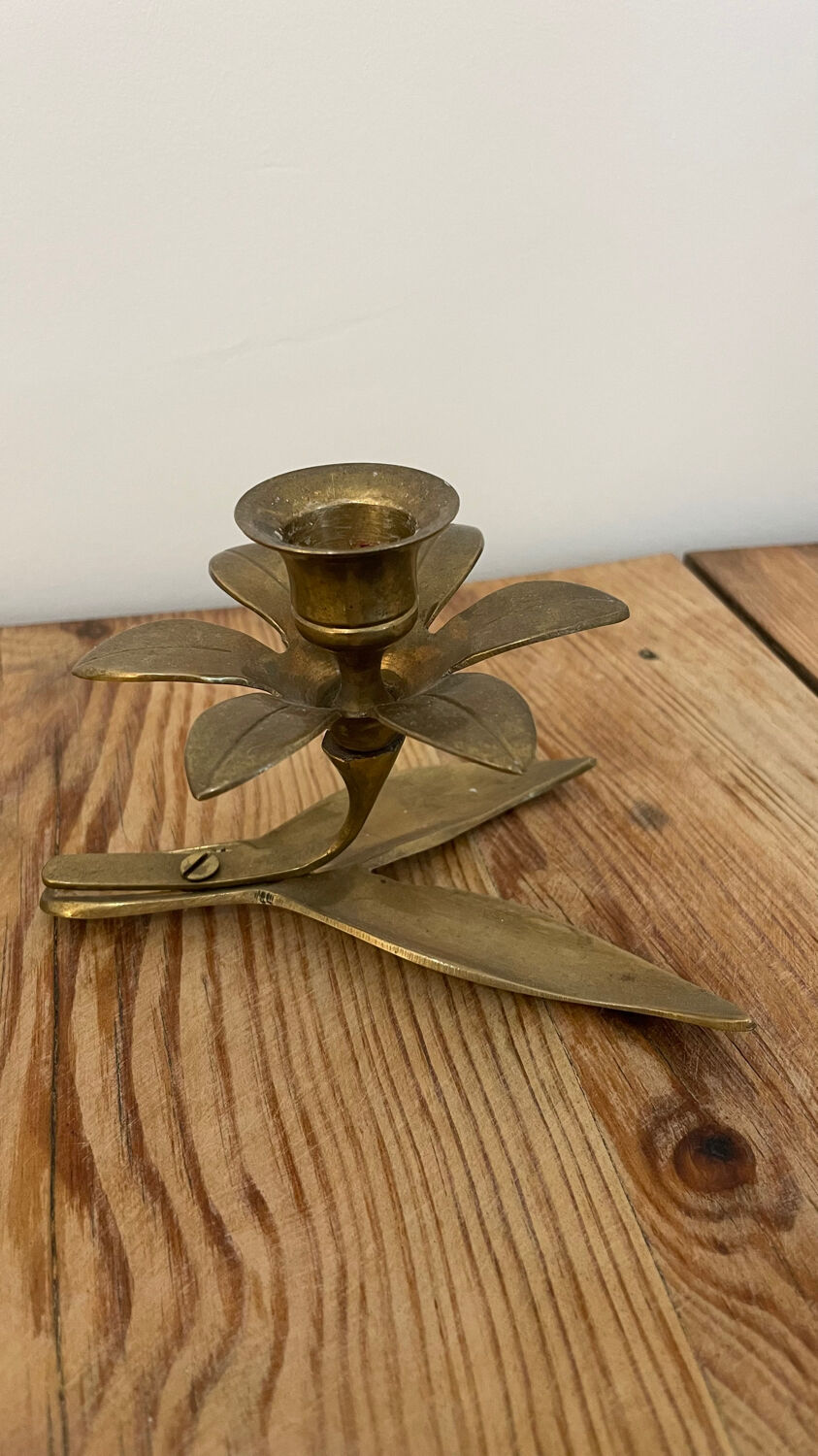 Pair of brass flower candlesticks