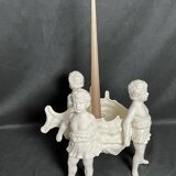 Porcelain, centerpiece with candle holder decorated with putti, 20th century
