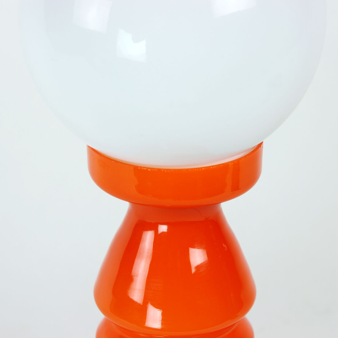 Orange glass table lamp by vitropol, poland 1960s