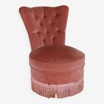 Powder pink fireside chair with fringes