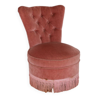 Powder pink fireside chair with fringes