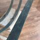Table basse en verre et métal patine antique