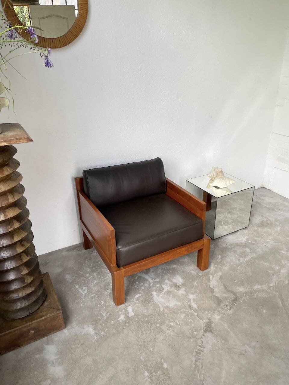 Modernist armchair in exotic wood and leather