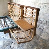 Twin rattan beds with built-in bedside tables