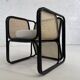 Cubic armchair in black rattan and canework