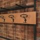 Wall coat holder in metal and wood 1960