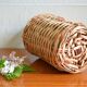 Viresa glass bottle and woven rattan