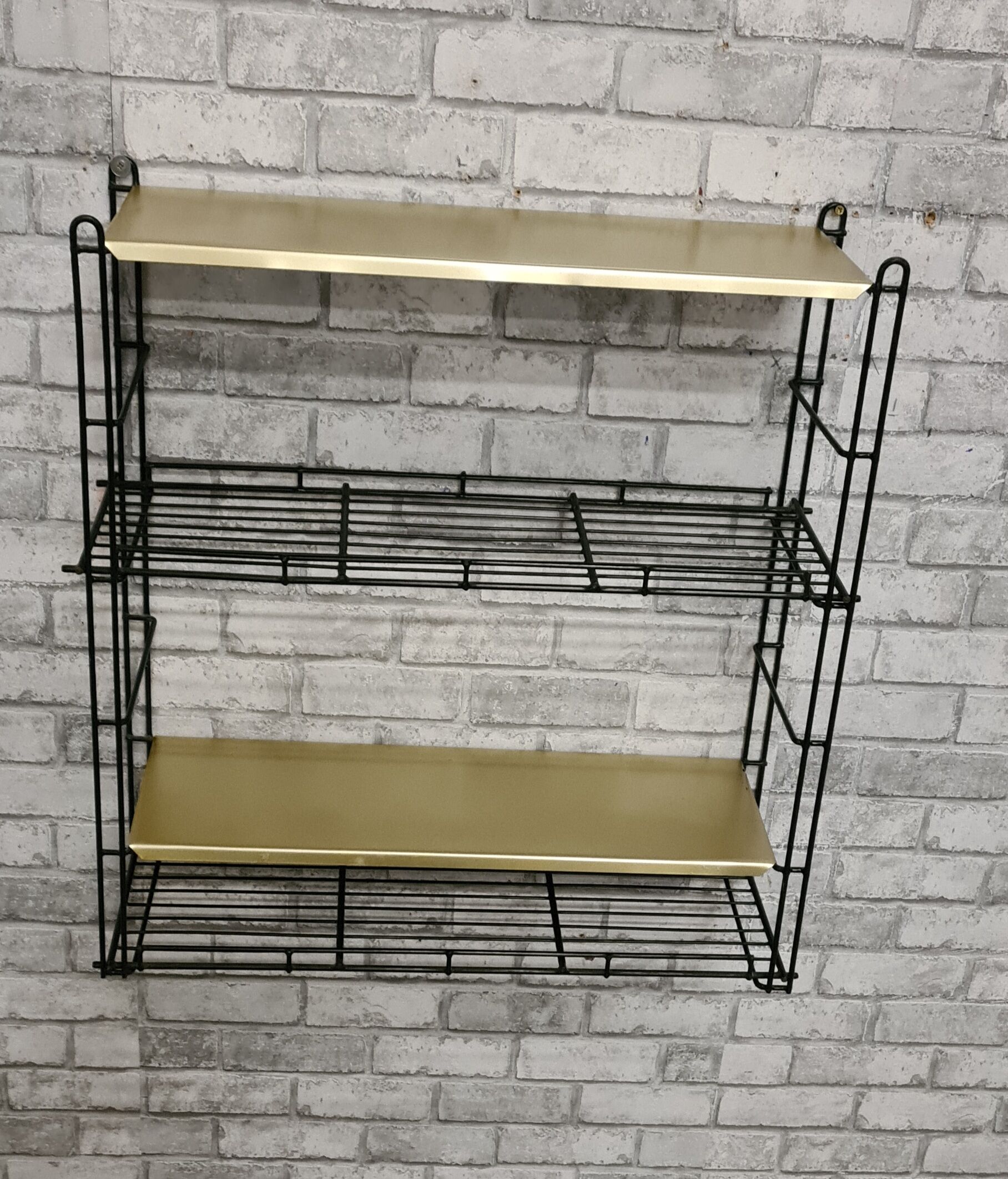Bronze and black metal shelf 1970