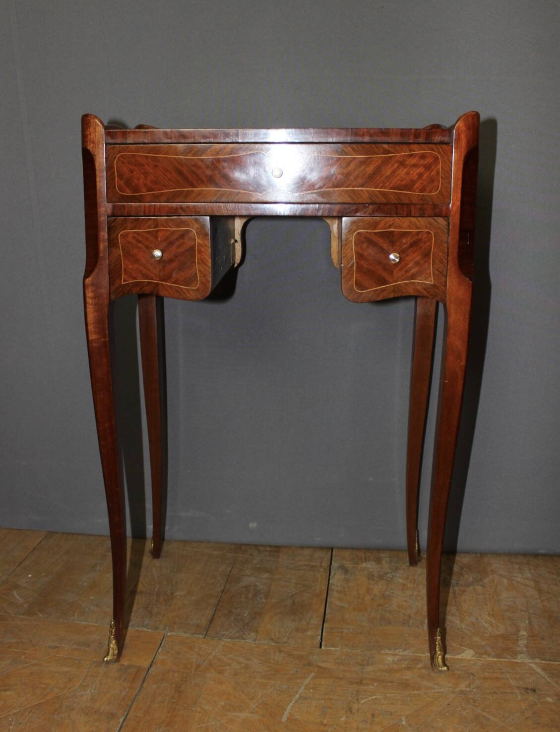 Pair of Louis XV style bedside tables in marquetry, 20th century.
