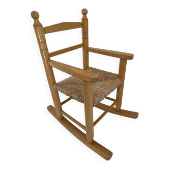 Rocking chair / children's wooden and straw rocking chair