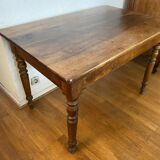 Walnut bistro table, feet turned.