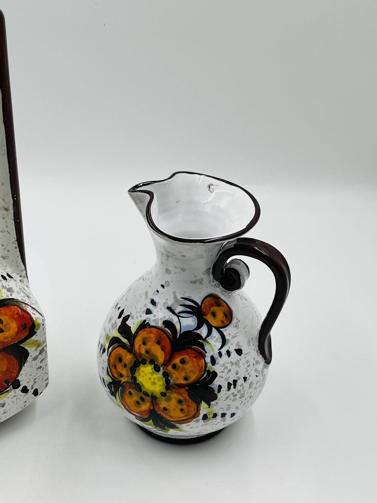 Pair of vintage hand-painted Italian floral vases