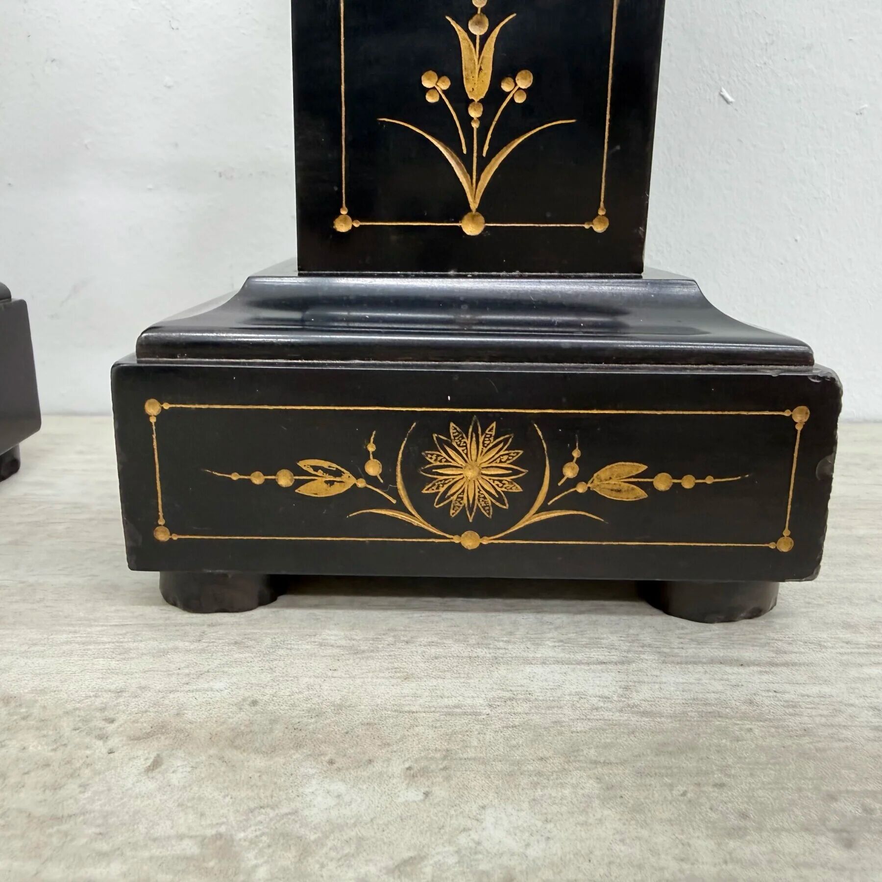Antique French black marble cassoulets gilt decor pedestals neoclassical pair, 1900s