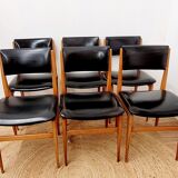 Six vintage wooden chairs and black Skaï
