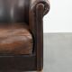 Characterful club armchair made of sheepskin with a beautiful patina