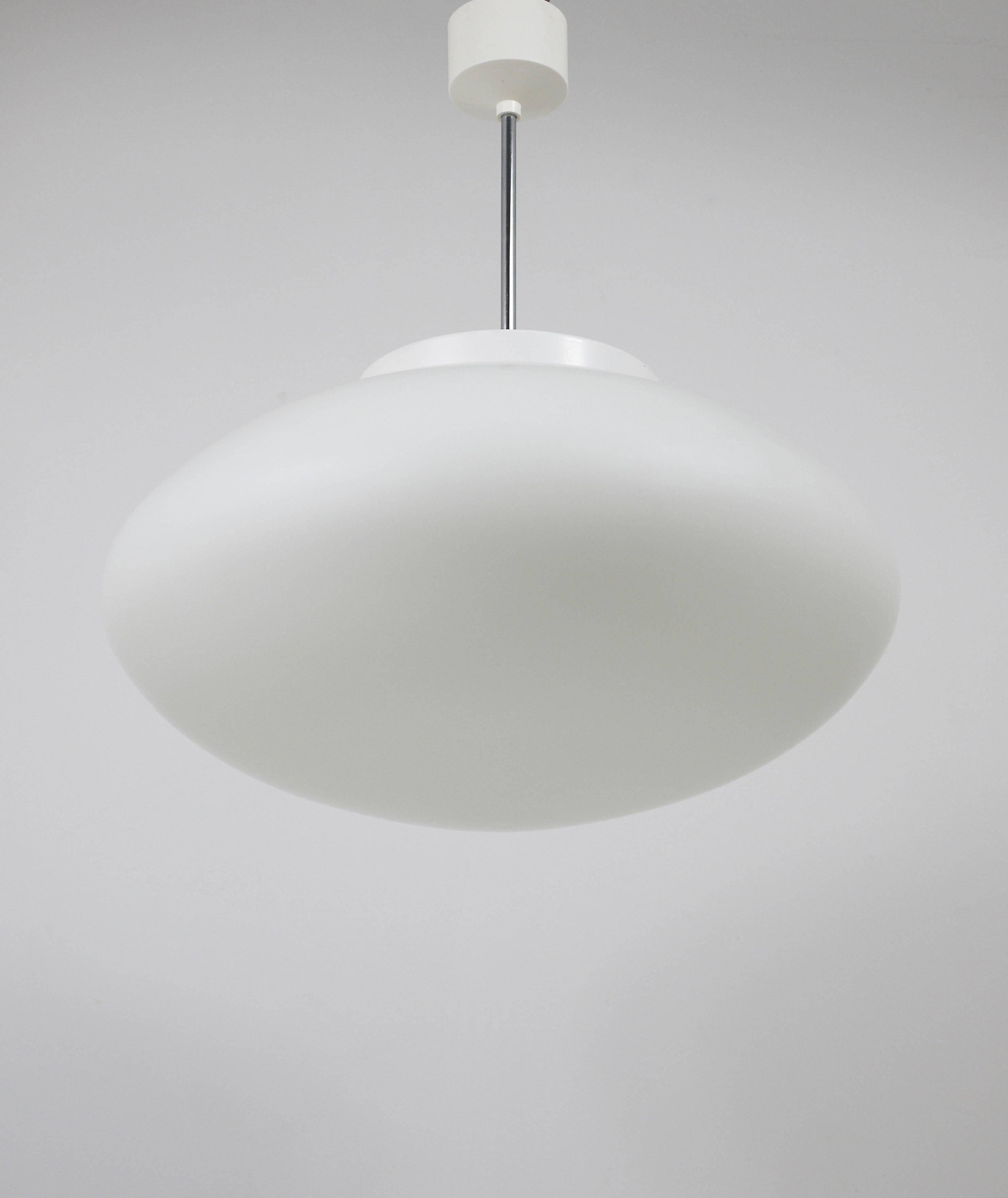 Up to 40 huge elliptical opaline glass pendants, in the style of Lisa Johansson-Pape.