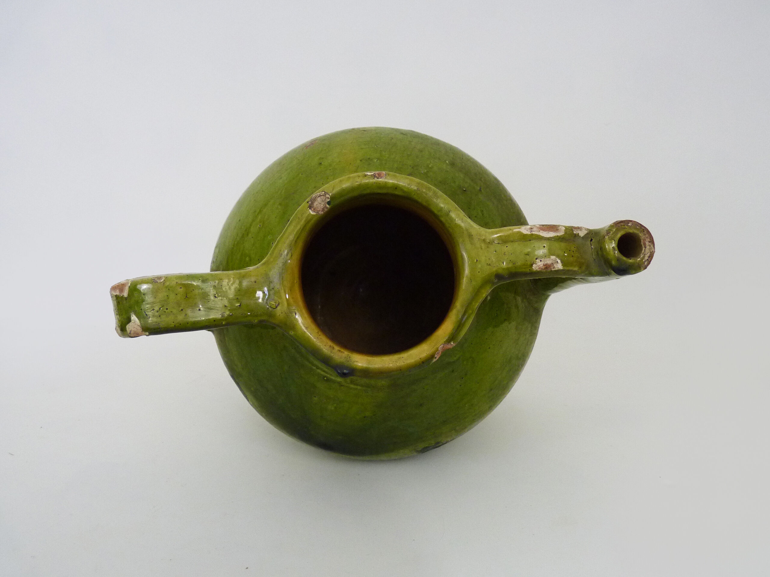 Orjol water pitcher pottery in green glazed terracotta. Pyrenees XIXth
