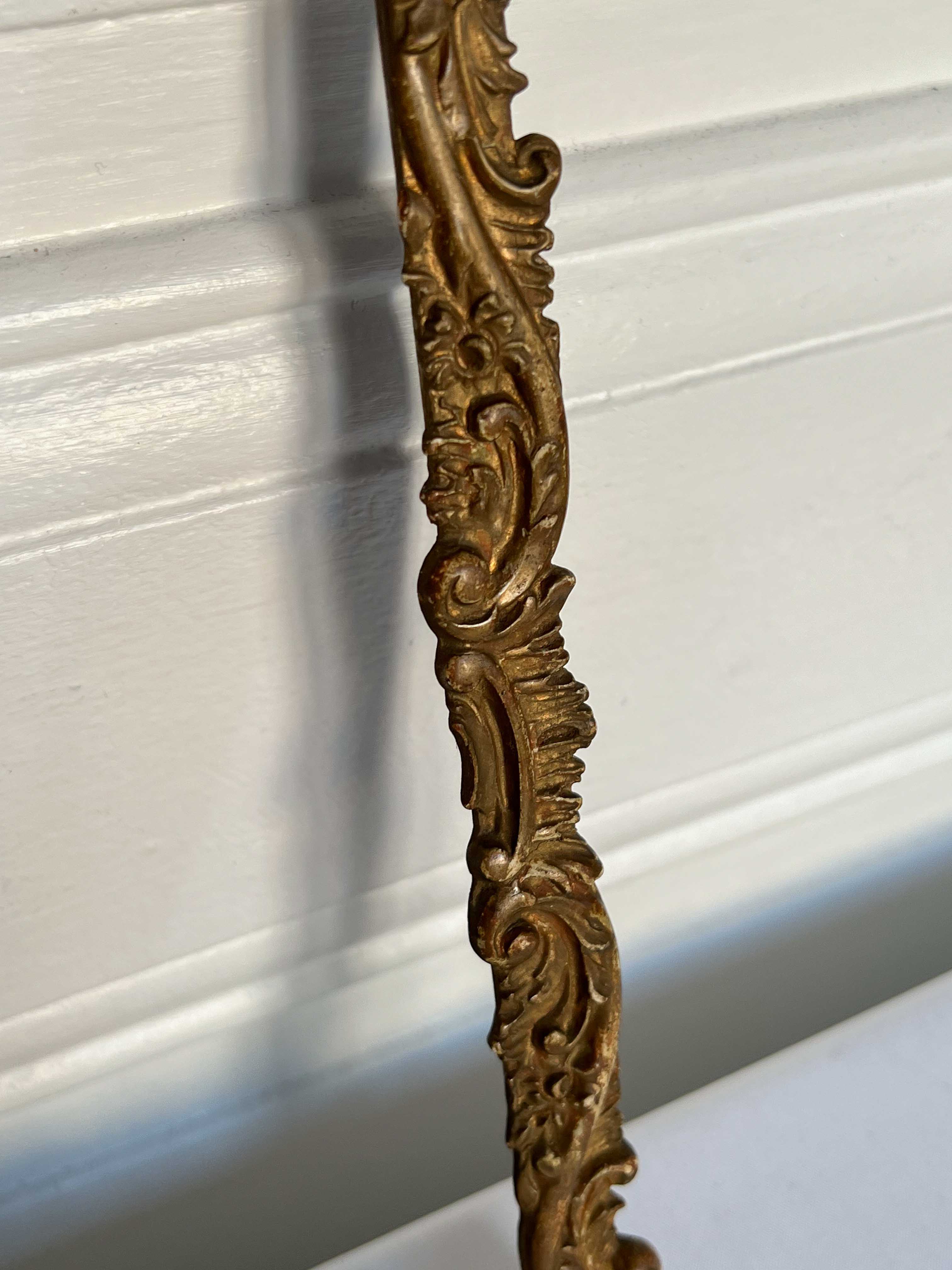 Frame with moldings to restore