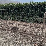 Folding wrought iron bed 1900