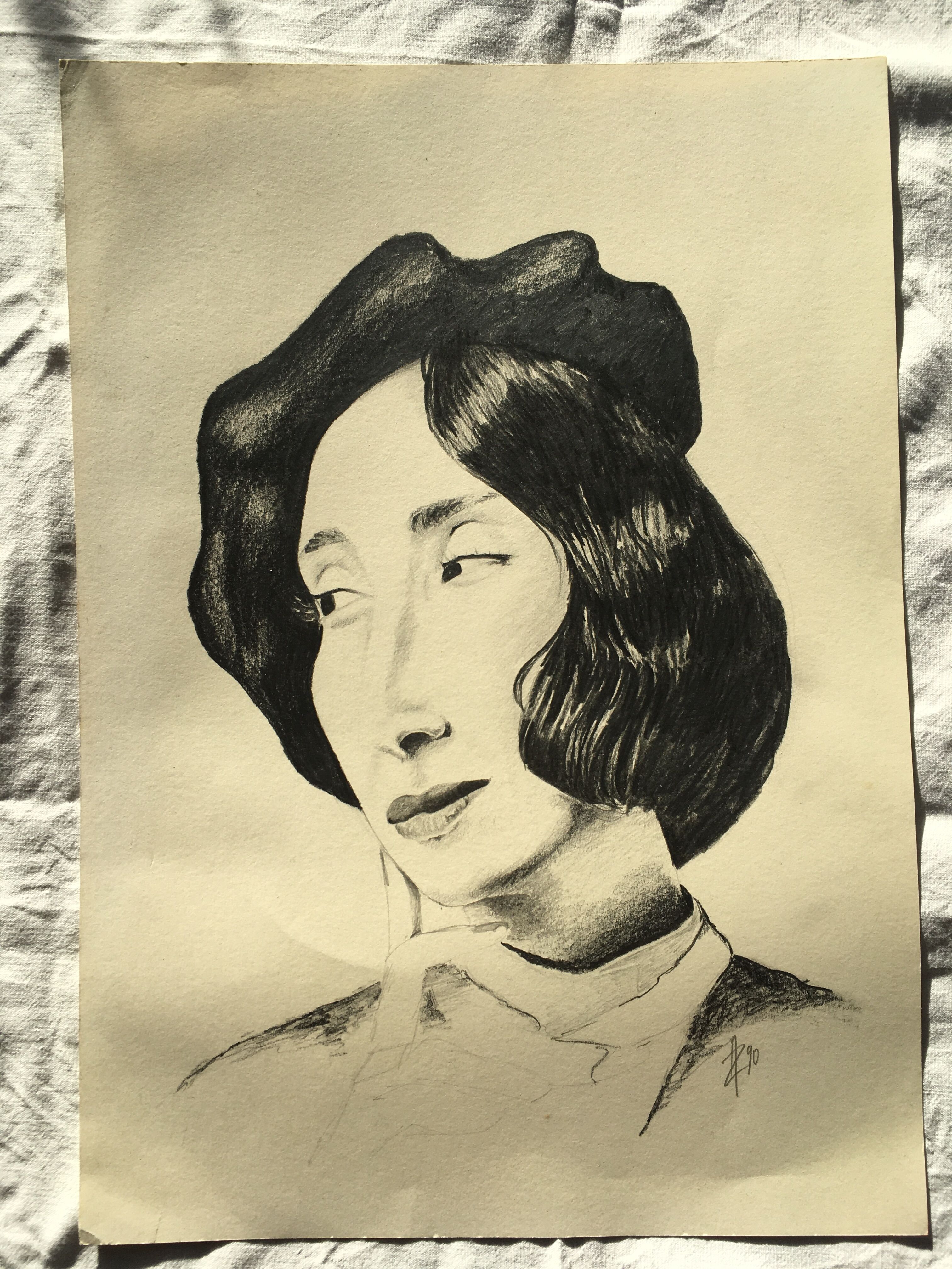 Portrait of a young woman in a beret